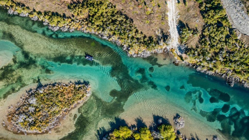 Aerial view of the braided turquoise channels of the Río Baker