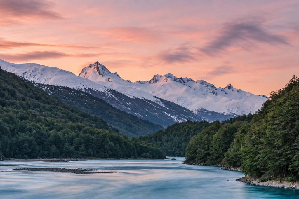 Snow-capped peaks above the Río Baker at dusk